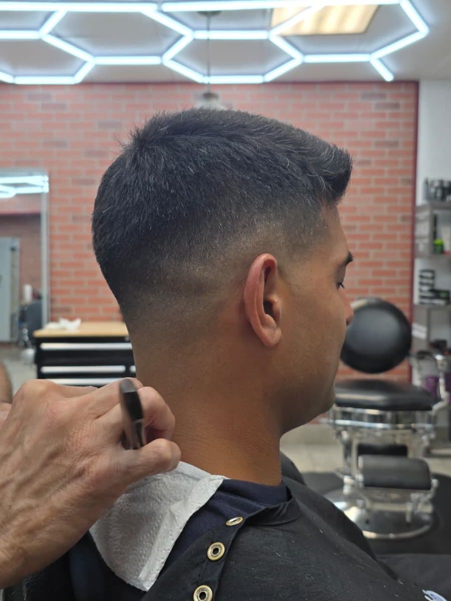 After: a clean fade, short and tight down to the neckline