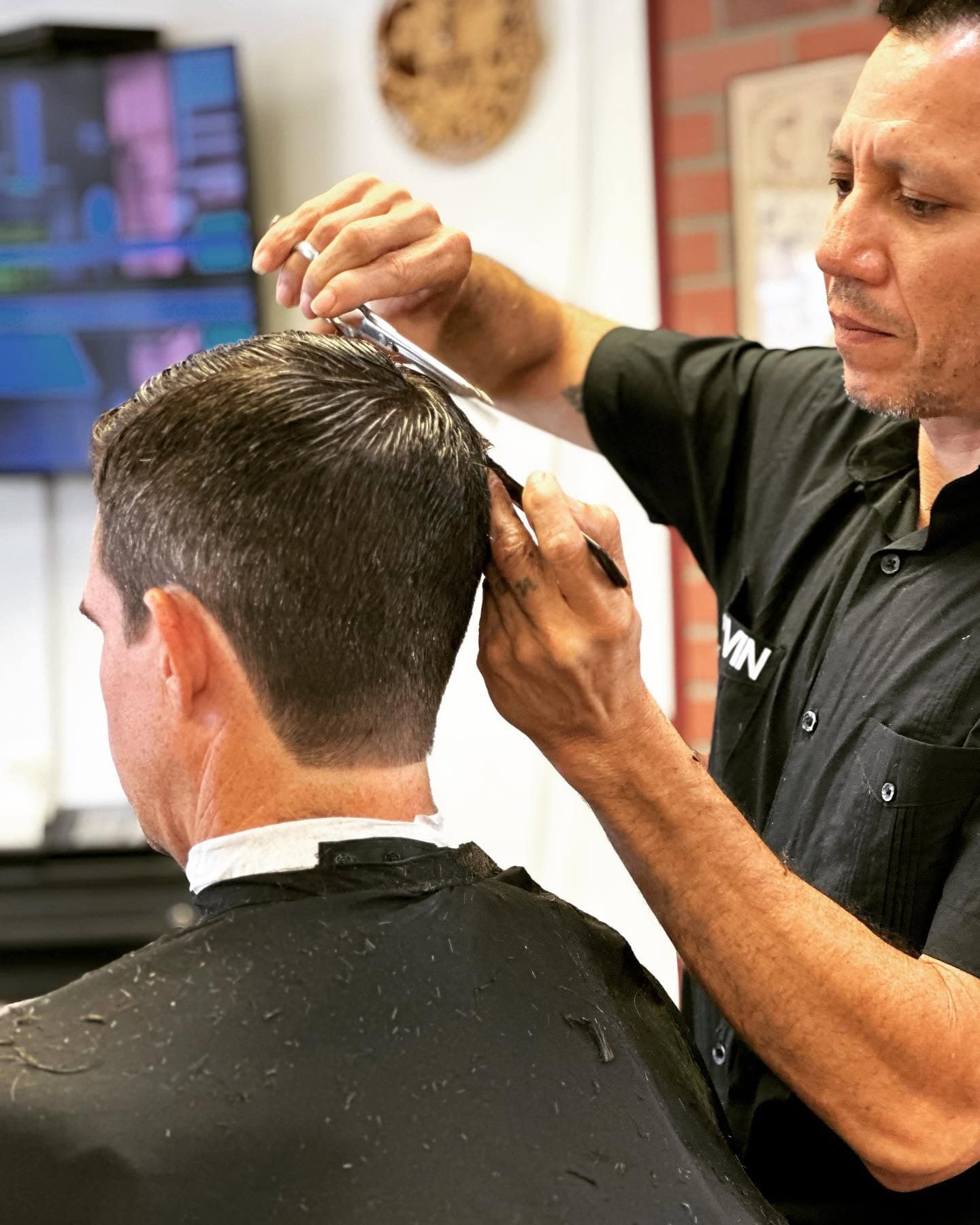 A barber at work in the chair